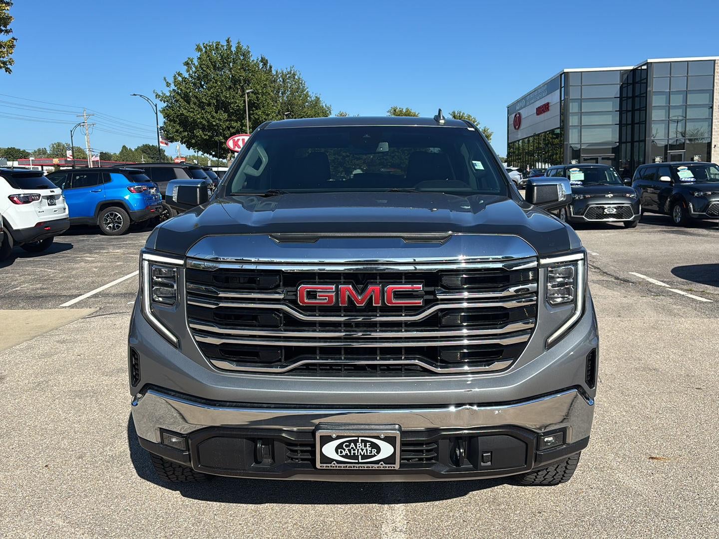Used 2023 GMC Sierra 1500 SLT with VIN 3GTUUDE85PG339841 for sale in Kansas City