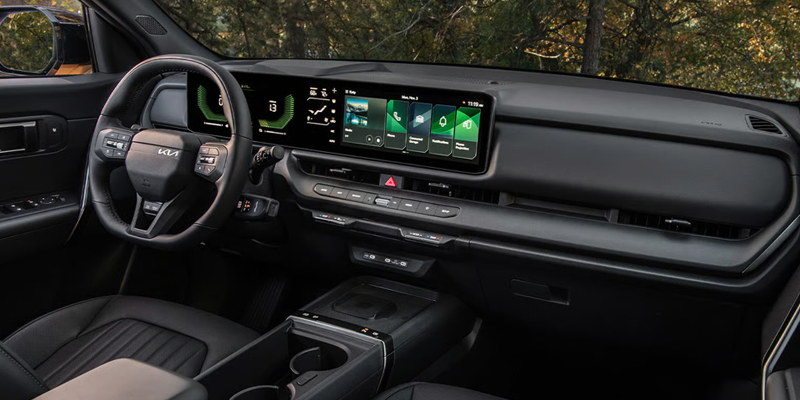 2027 Kia Seltos interior showing dual 12.3-inch panoramic display cockpit