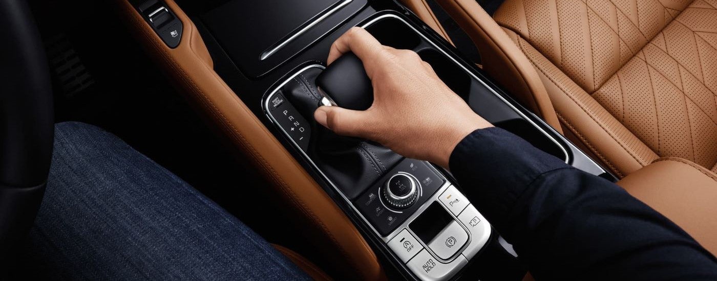 Person is using the shifter in a 2025 Kia Telluride X-Pro