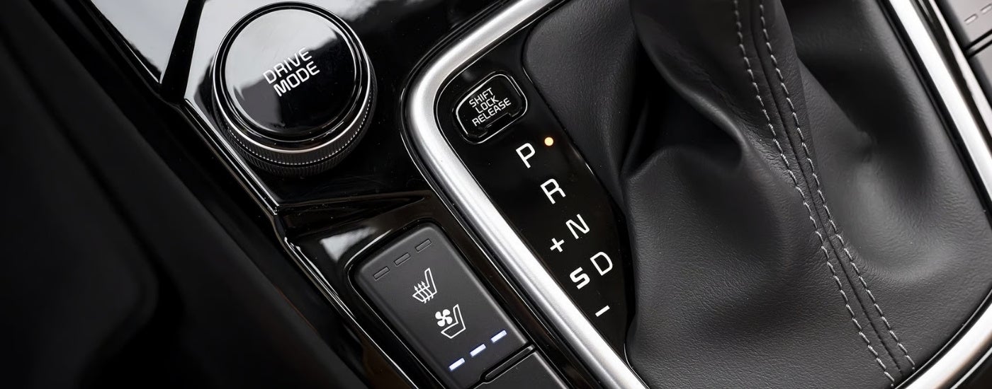 Shifter in the center console of a 2026 Kia Seltos